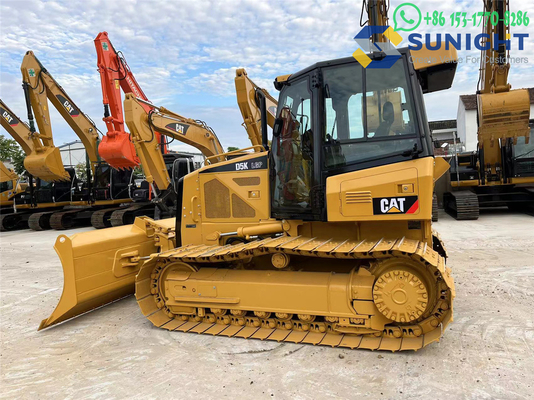 Bulldozer Caterpillar D5K Crawler usado con componentes principales del motor Cummins, incluida la caja de engranajes de rodamiento de la bomba del motor